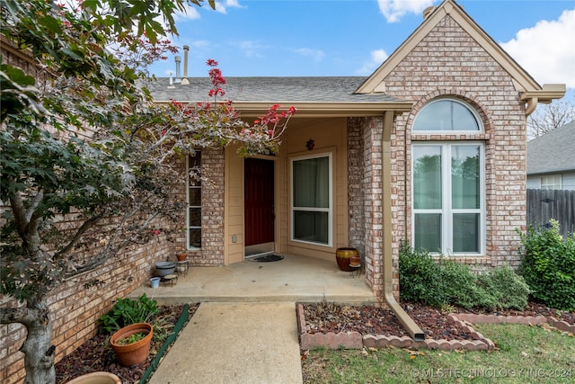 doorway to property with a patio