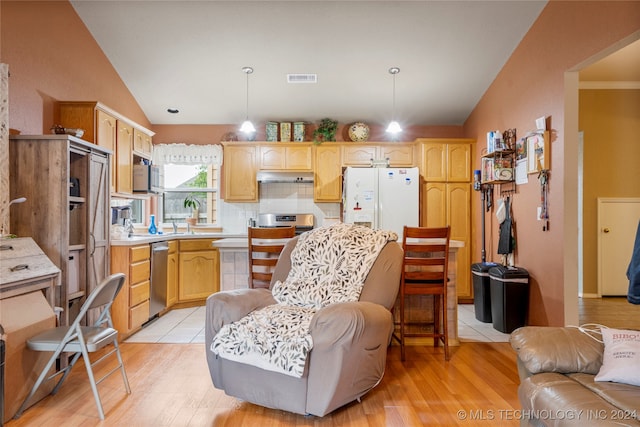 kitchen featuring lofted ceiling, white fridge with ice dispenser, pendant lighting, light wood-type flooring, and light brown cabinetry