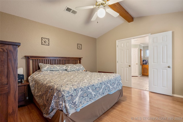 bedroom featuring ceiling fan, light wood-type flooring, and lofted ceiling with beams