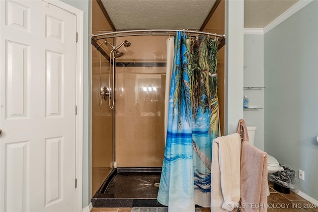 bathroom with ornamental molding, curtained shower, a textured ceiling, and toilet