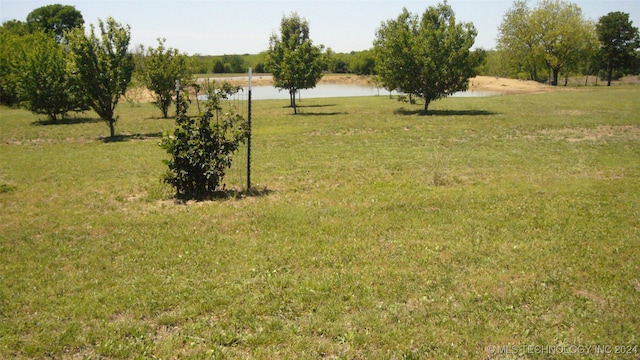 view of yard with a water view