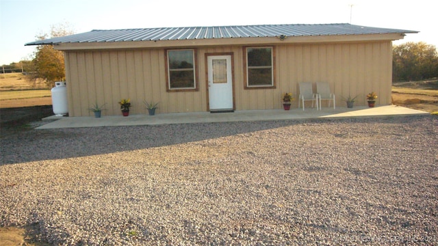 view of front facade with a patio area