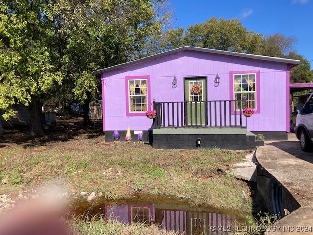 view of front of house with covered porch