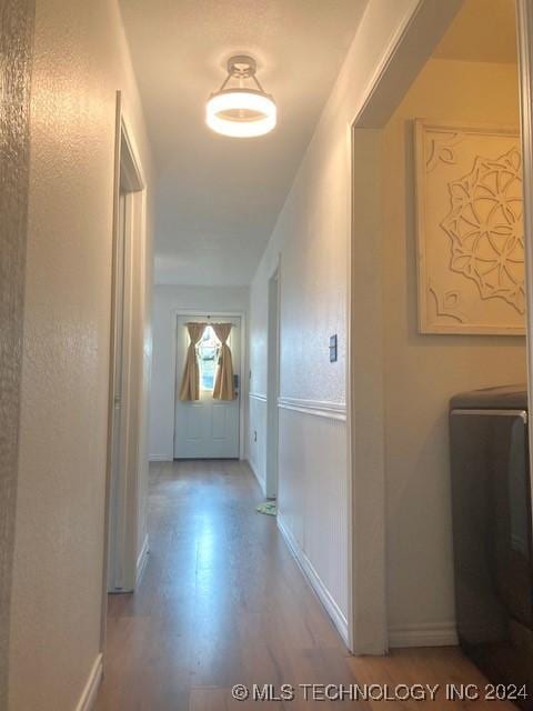 hallway featuring light wood-type flooring