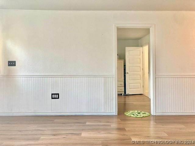 unfurnished room featuring light wood-type flooring