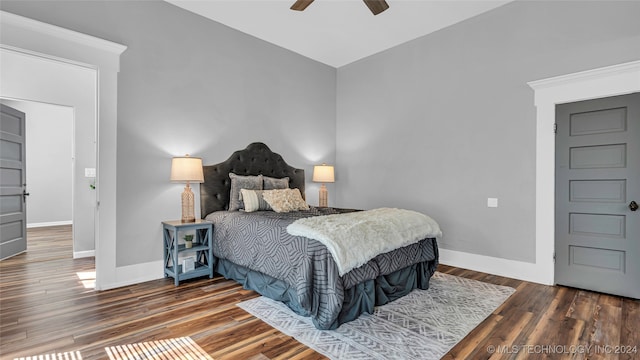 bedroom featuring dark wood-type flooring and ceiling fan