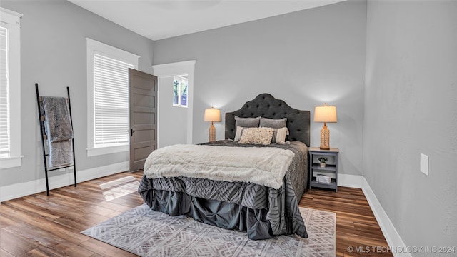 bedroom featuring hardwood / wood-style flooring