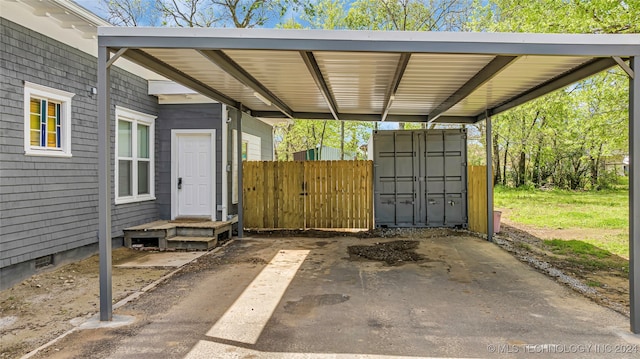 view of patio / terrace with a carport