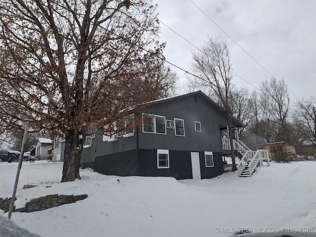 400 Tulsa Ave, Spavinaw, OK 74366 - snow covered property with stairway