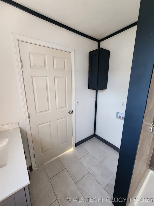 400 Tulsa Ave, Spavinaw, OK 74366 - unfurnished bedroom featuring light tile patterned flooring and baseboards
