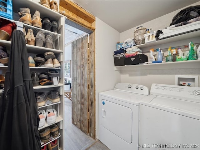 laundry room with separate washer and dryer