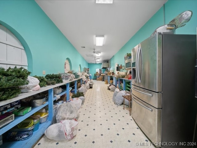 kitchen featuring appliances with stainless steel finishes and ceiling fan