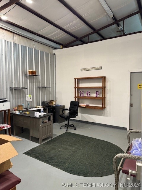 office area featuring concrete flooring