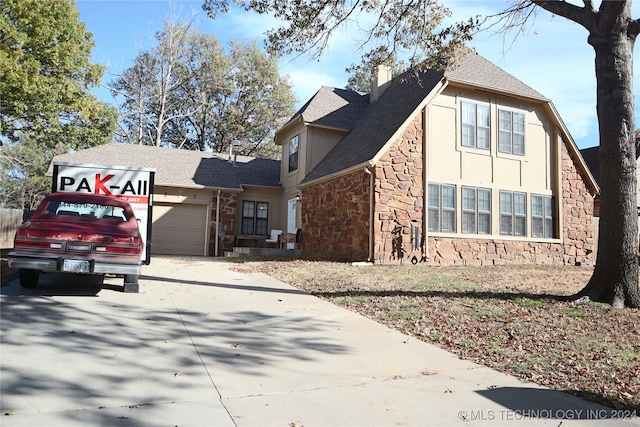 view of property exterior featuring a garage