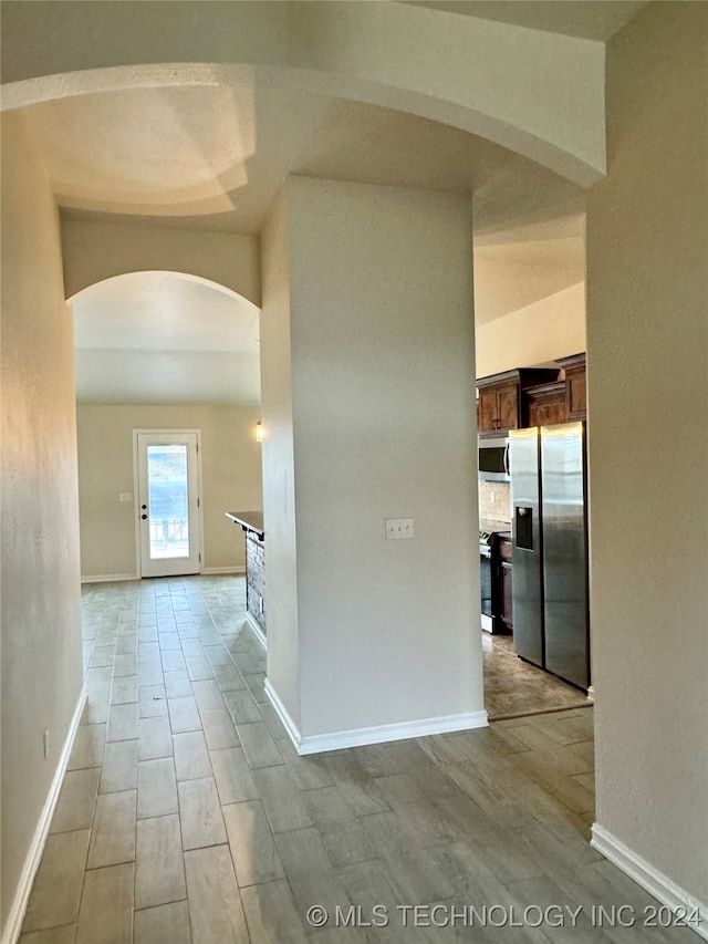 hall featuring light wood-type flooring