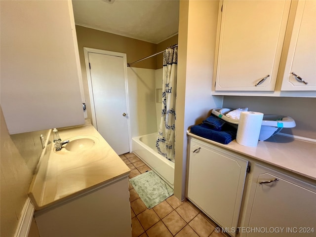 bathroom with vanity, shower / bath combination with curtain, and tile patterned floors