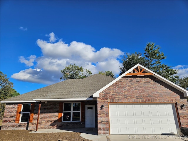 ranch-style home with a garage