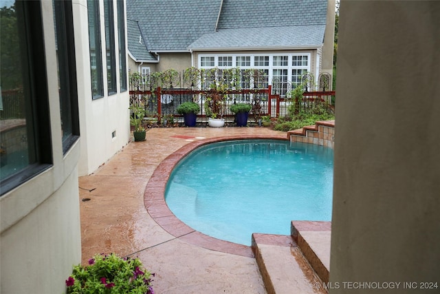 8403 S Allegheny Ave, Tulsa, OK 74137 - outdoor pool featuring a patio