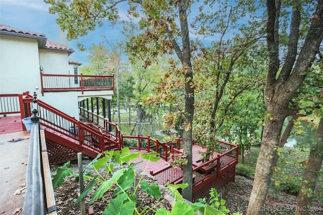 view of yard featuring a wooden deck