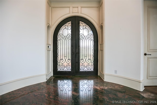 8403 S Allegheny Ave, Tulsa, OK 74137 - entrance foyer featuring french doors and arched walkways