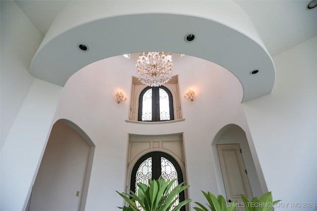 8403 S Allegheny Ave, Tulsa, OK 74137 - detailed view of a chandelier, arched walkways, and french doors