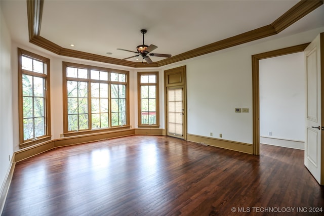 unfurnished room featuring ceiling fan, dark wood-type flooring, and ornamental molding