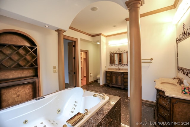 8403 S Allegheny Ave, Tulsa, OK 74137 - full bathroom with ornate columns, toilet, a whirlpool tub, ornamental molding, and two vanities