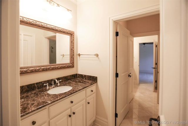 8403 S Allegheny Ave, Tulsa, OK 74137 - bathroom featuring vanity and tile patterned flooring