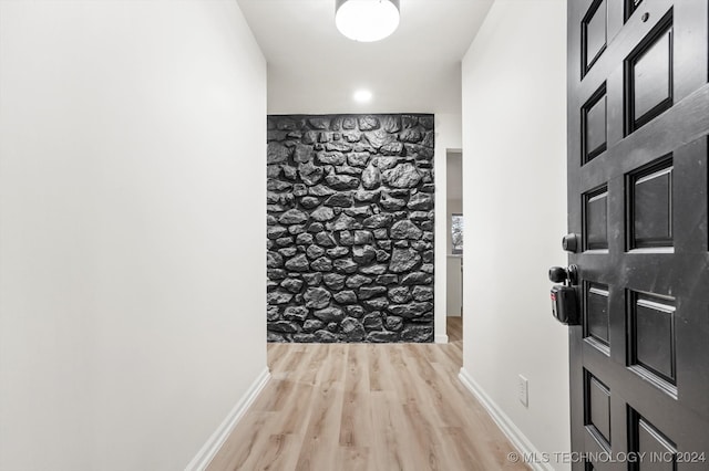 hallway featuring light wood-type flooring