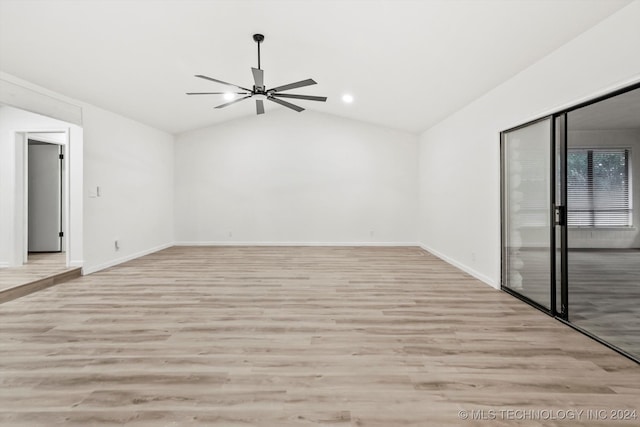 unfurnished room with light wood-type flooring, lofted ceiling, and ceiling fan