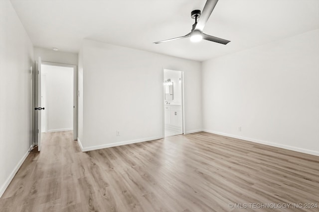 unfurnished bedroom with light hardwood / wood-style floors, ceiling fan, and ensuite bathroom