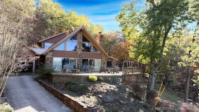 exterior space featuring a wooden deck