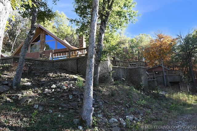 exterior space with a wooden deck