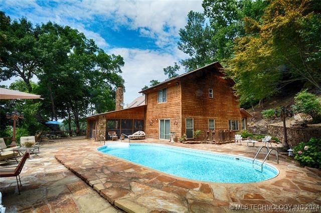 view of pool with a patio