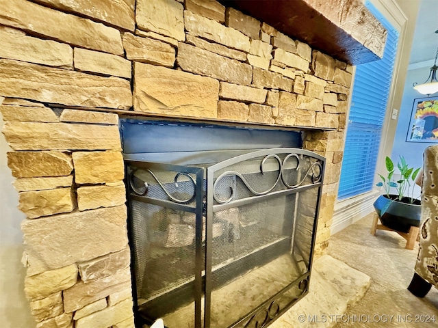 interior details with a fireplace