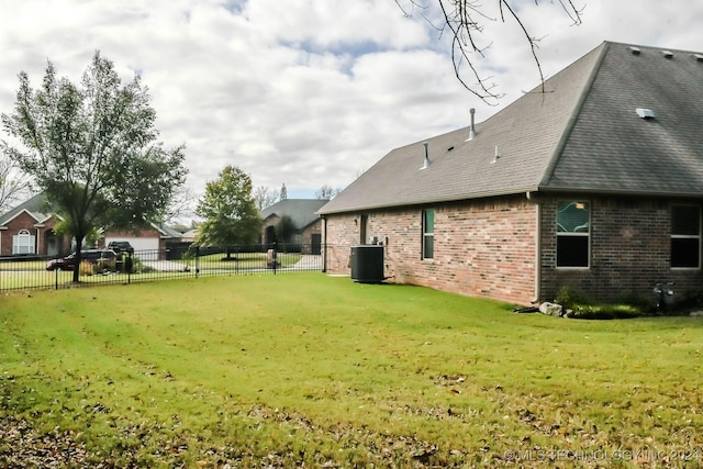 view of yard featuring central AC