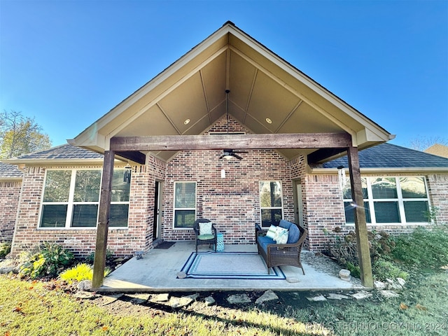 back of house with a patio