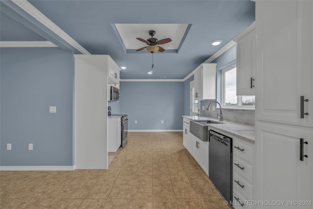 kitchen with sink, ceiling fan, light stone countertops, white cabinetry, and appliances with stainless steel finishes