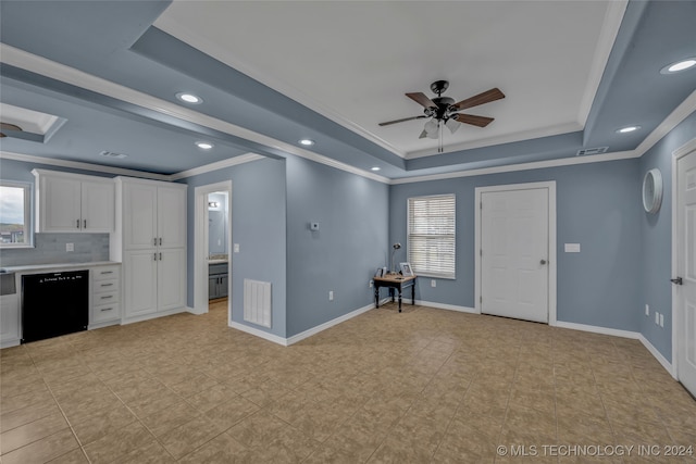 kitchen with dishwasher, white cabinets, crown molding, and plenty of natural light