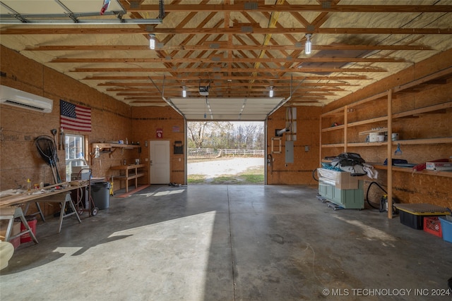 garage featuring a wall mounted AC and a garage door opener