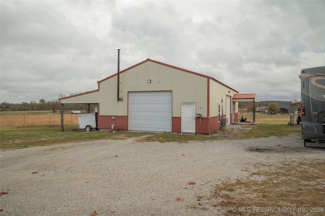 view of outdoor structure featuring a garage