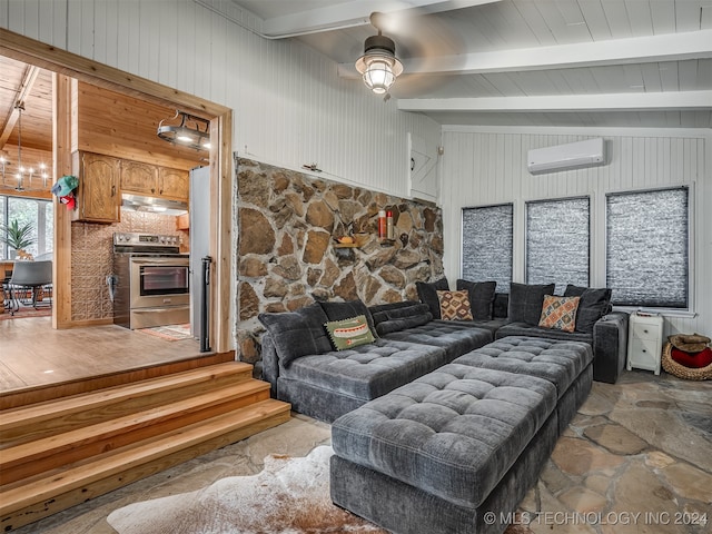 living room featuring ceiling fan with notable chandelier, vaulted ceiling with beams, wood walls, and an AC wall unit