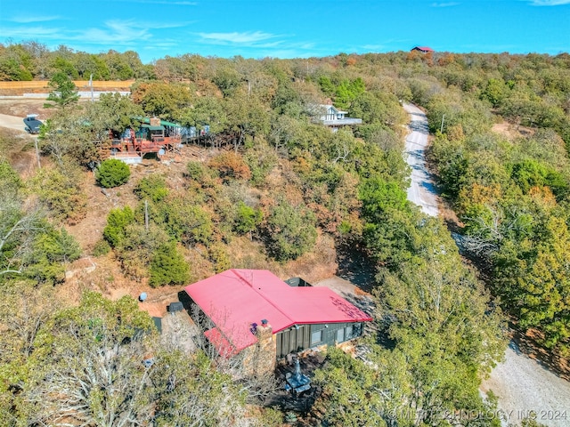 drone / aerial view with a view of trees