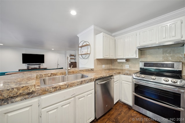 kitchen featuring white cabinetry, sink, appliances with stainless steel finishes, crown molding, and dark wood-type flooring