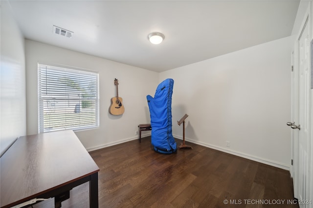 misc room with dark wood-type flooring