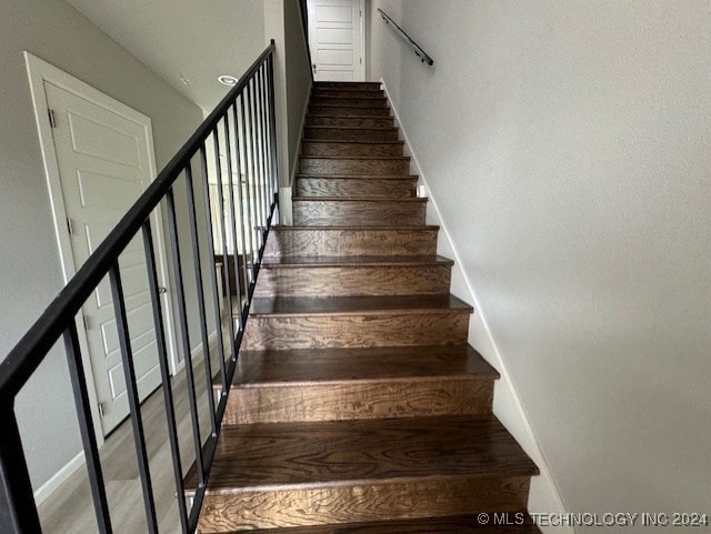 3402 Redbud Ln, Tulsa, OK 74132 - stairway featuring baseboards