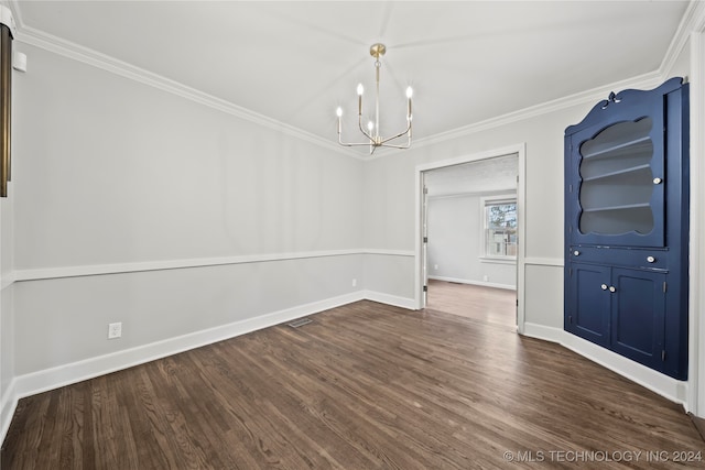 unfurnished dining area with dark wood-type flooring, crown molding, and a notable chandelier