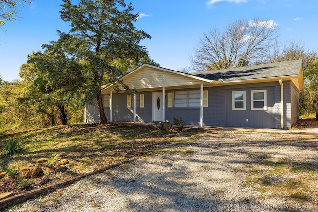 ranch-style house with a porch