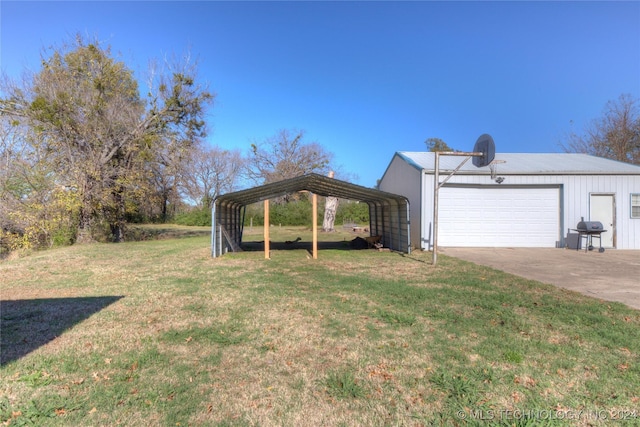 15705 Old Morris Hwy, Okmulgee, OK 74447 - view of green lawn with a garage, a carport, and an outbuilding