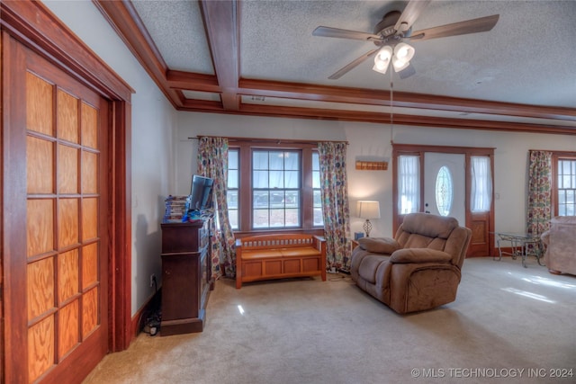 15705 Old Morris Hwy, Okmulgee, OK 74447 - living room with a textured ceiling, light colored carpet, a ceiling fan, beamed ceiling, and coffered ceiling